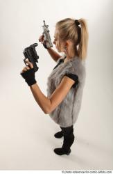NIKOL STANDING POSE WITH TWO GUNS